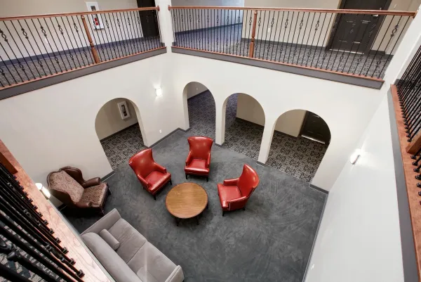 Looking down into the atrium from the upper-floor balcony