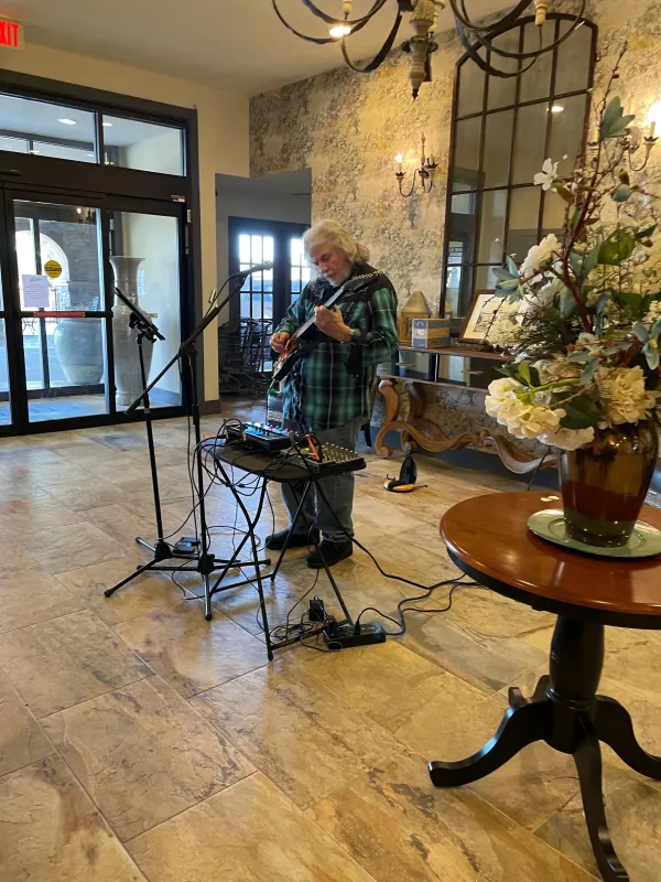 A musician performing live at a community event