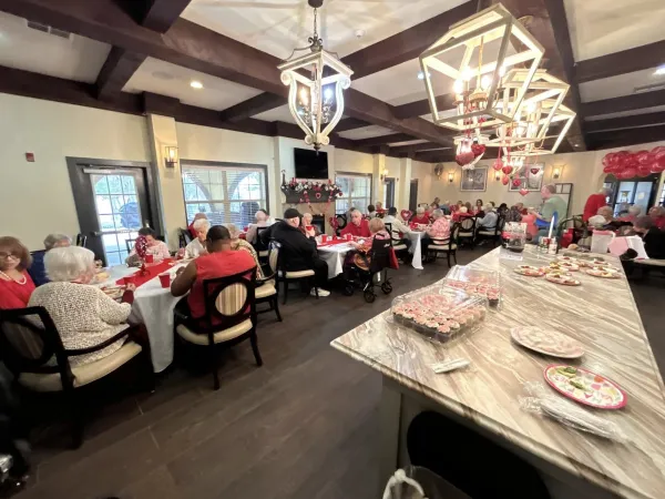 Residents celebrating together at a Valentine's Day party