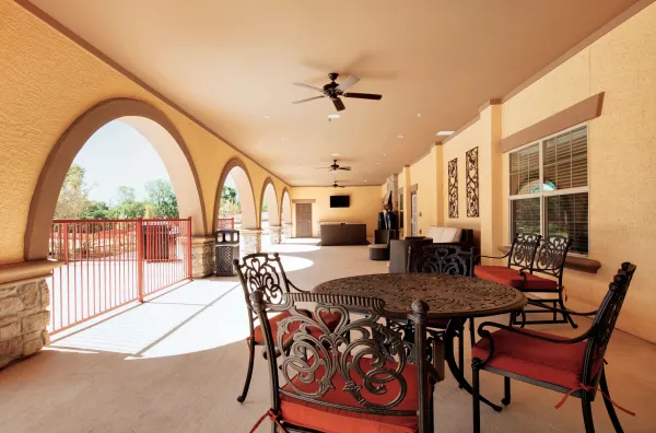 The covered veranda overlooking the grounds